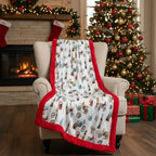 Decorative blanket with vehicle pattern on a chair in a festive living room with Christmas tree and stockings.