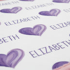 Stickers with 'ELIZABETH' and heart designs on a white background