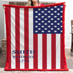 Close-up of woman holding personalized American flag blanket with red sherpa trim