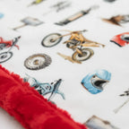 Children's blanket with cartoon characters and red border