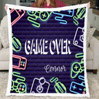 Neon-themed blanket with 'GAME OVER' and 'Connor' text, held by a person in a living room.