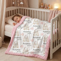 A baby sleeping in a white wooden crib, covered with a white blanket featuring a repeating pattern of gray bunny illustrations, the text 'Aurora JEAN', and a soft pink fuzzy border.