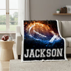 Blanket with 'JACKSON' printed on it in a living room setting