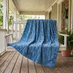 Close-up of soft blue Luxe Cuddle Minky fabric texture on porch swing