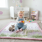 Toddler girl sitting on personalized baby donkey minky blanket with pink trim holding donkey plush