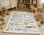 Personalized baseball blanket flat lay in nursery with toys and teddy bear