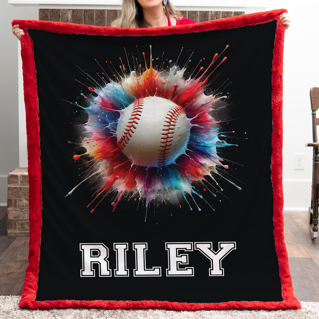 Personalized baseball minky blanket with red trim and custom name, held by a woman
