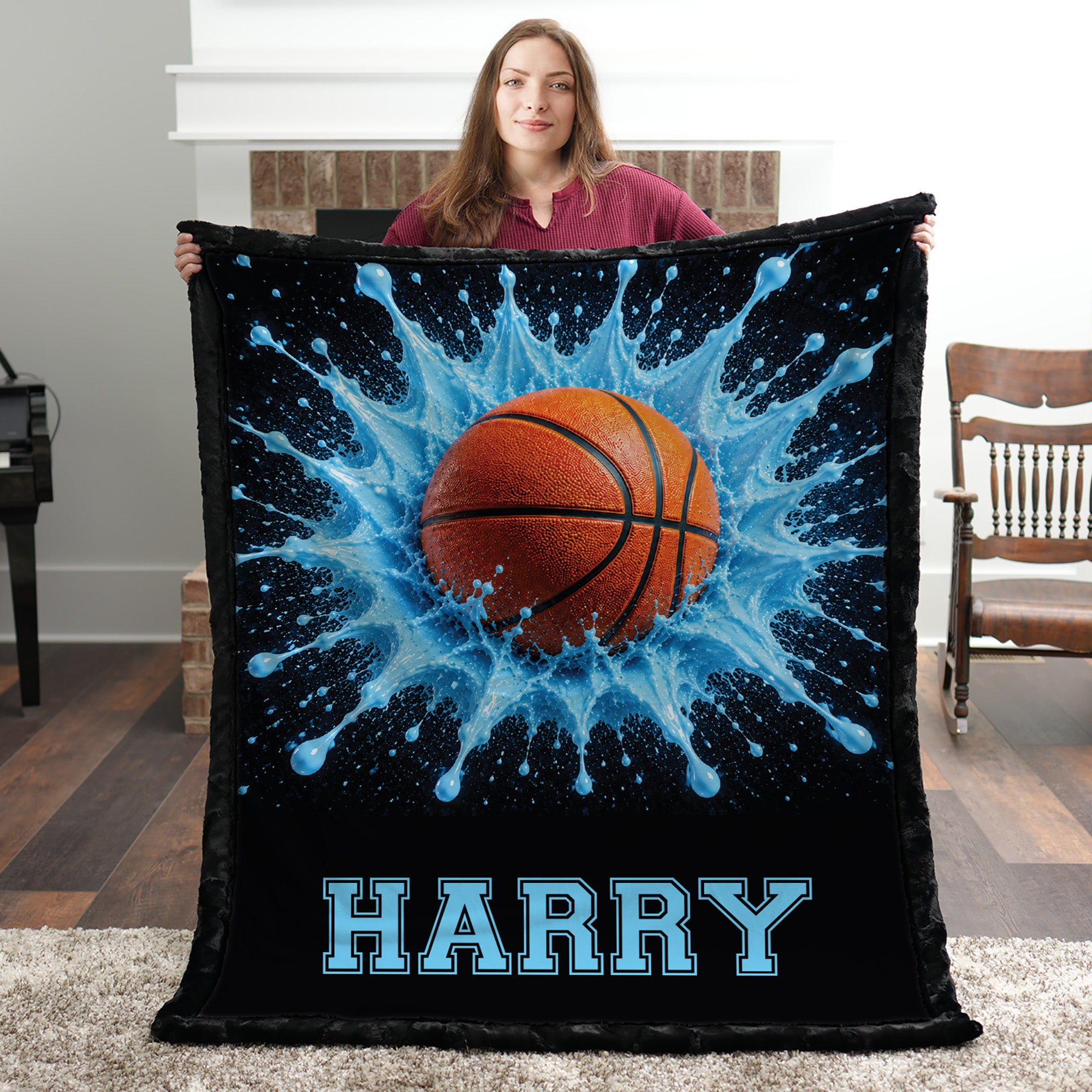 Woman holding personalized basketball blanket with custom name, black faux fur trim border