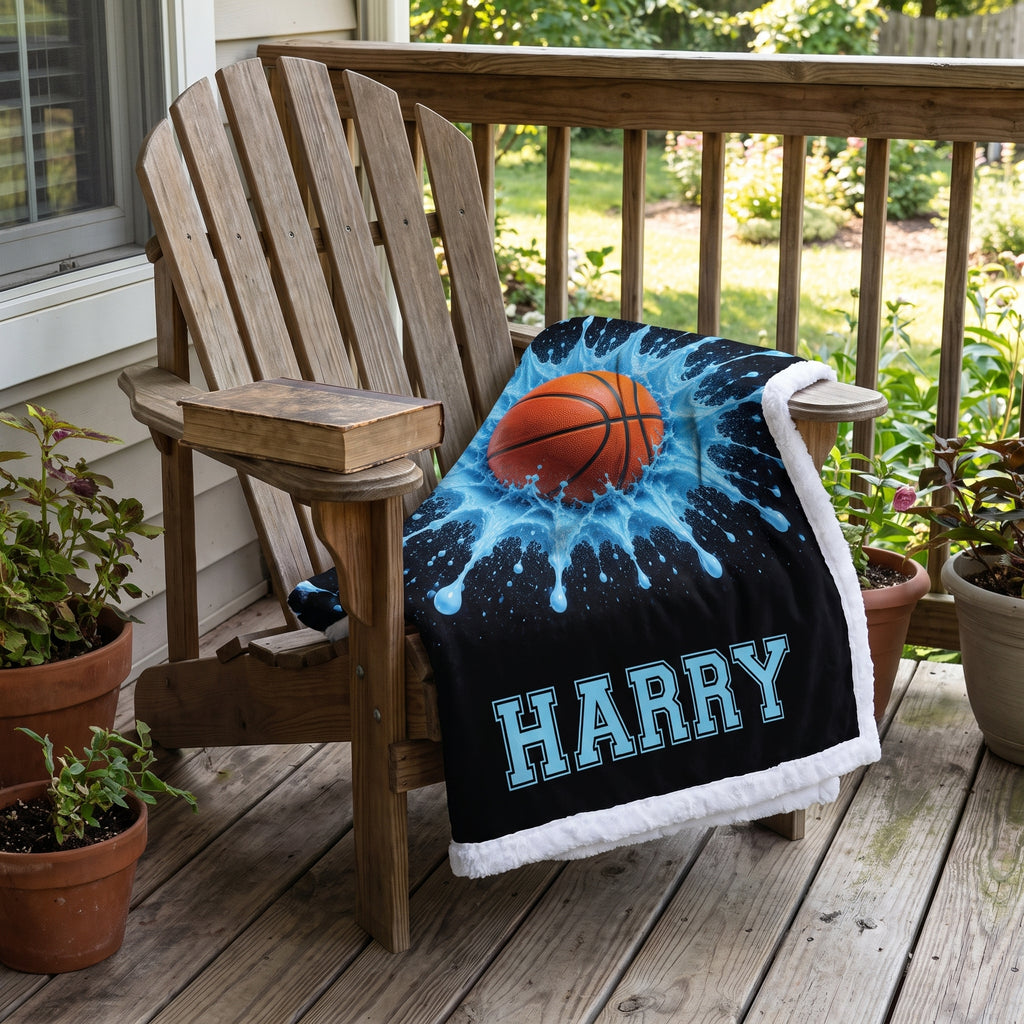 Personalized basketball blanket with custom name draped over wooden chair on porch