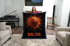 Personalized basketball minky blanket with navy trim and custom name, held by a woman