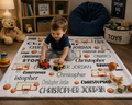 Toddler playing with toy trucks on personalized basketball name blanket with white trim