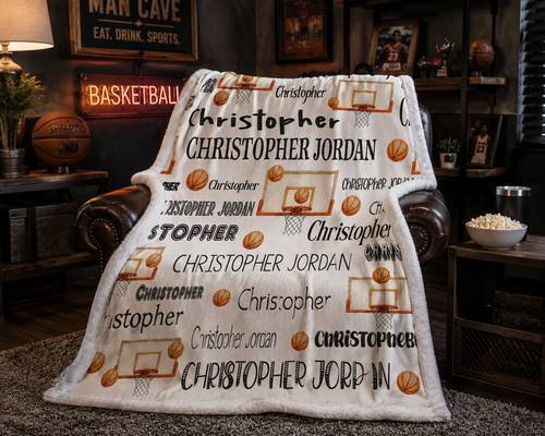 Personalized basketball name blanket with white faux fur trim draped over leather armchair