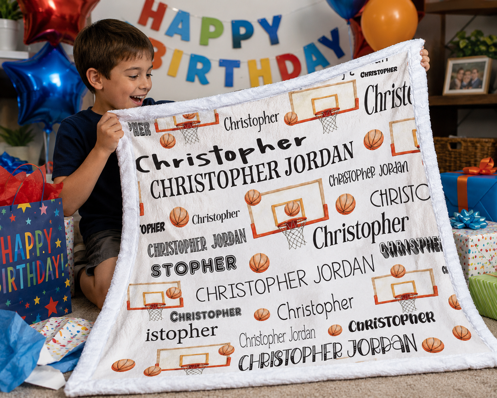 Boy holding personalized basketball name blanket with white trim at birthday party