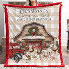 Woman holding personalized Christmas farmhouse minky blanket with red trim indoors