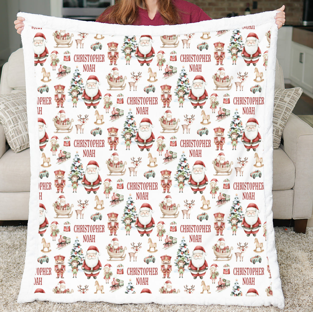 Personalized Christmas minky blanket with Santa print held up showing white sherpa back
