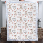 Personalized minky donkey baby blanket with white fur border held up by fireplace