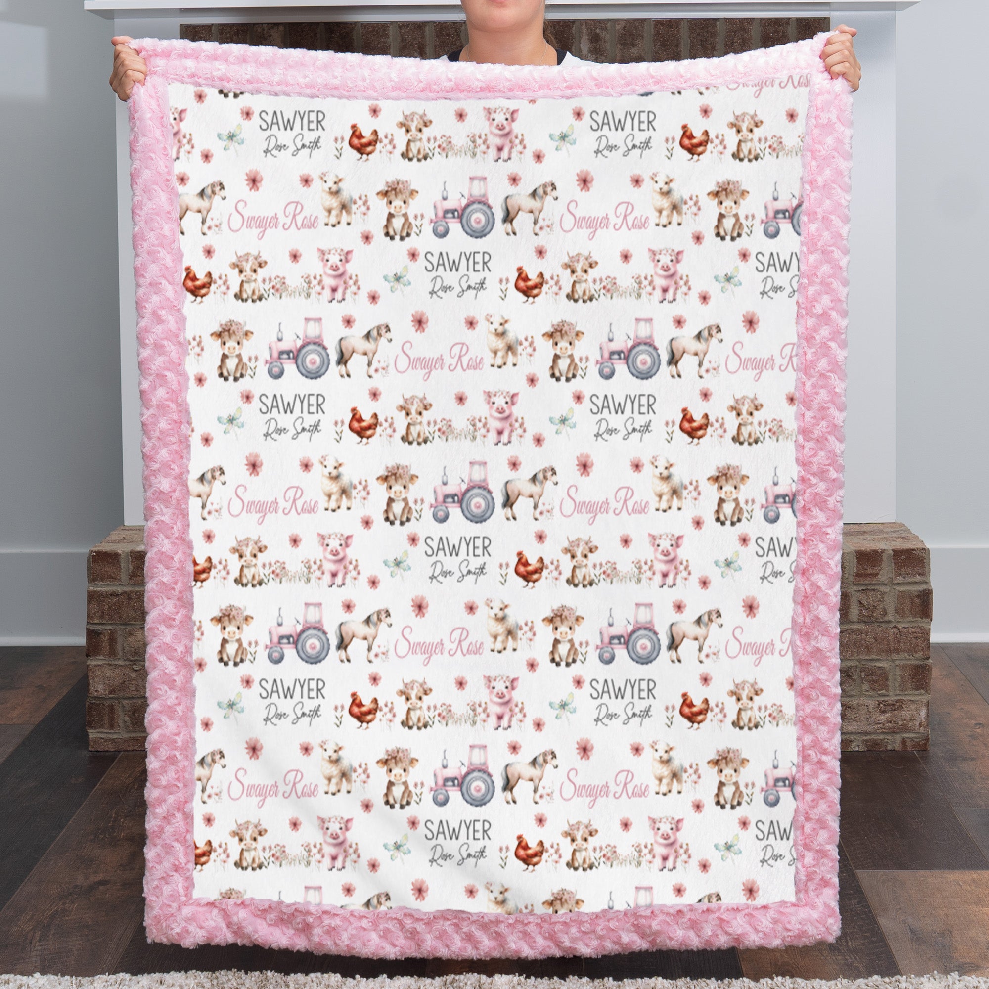 Folded personalized farm animal minky baby blanket styled flat lay