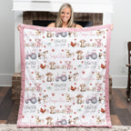 Personalized farm animal minky baby blanket laid flat showing full pattern and embroidered name