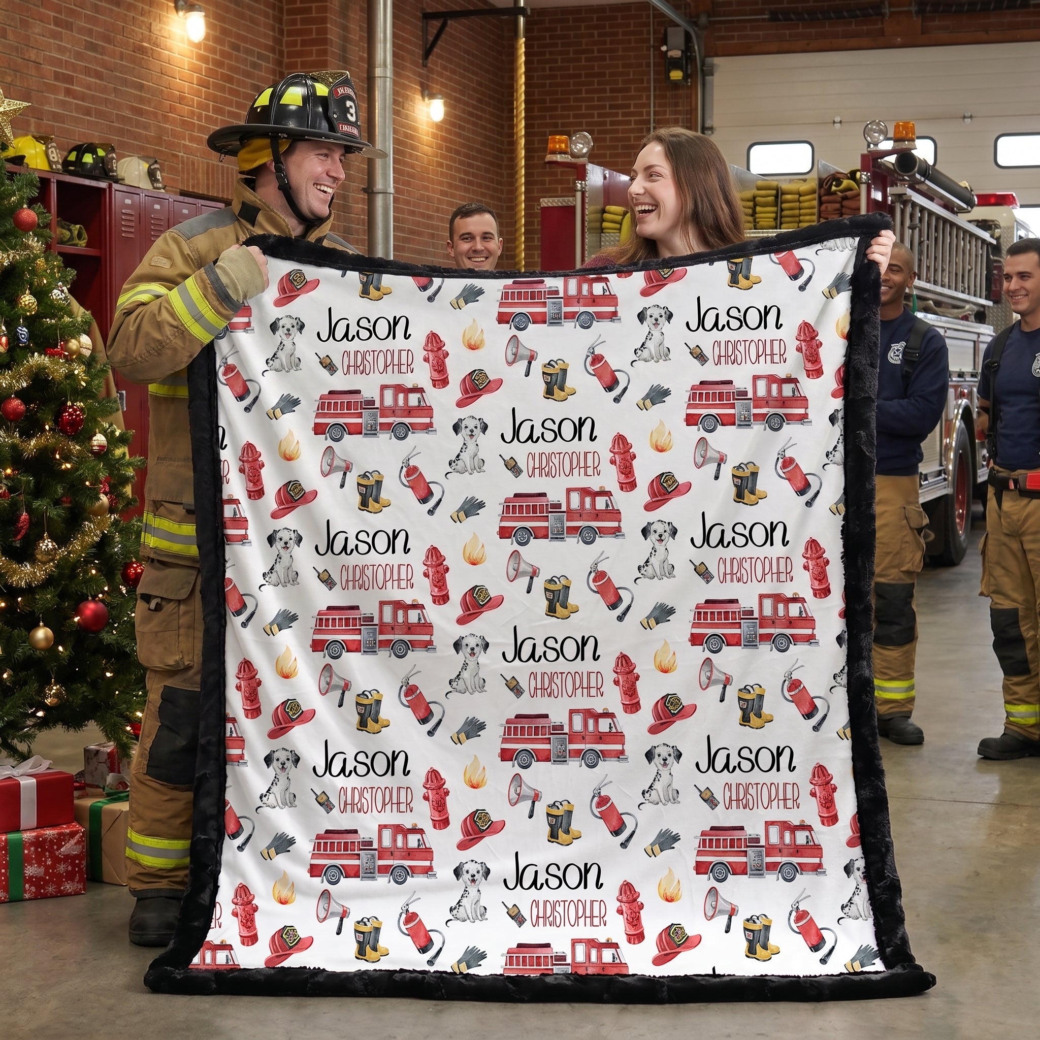 Personalized firefighter baby blanket with black faux fur border, held by firefighters at fire station