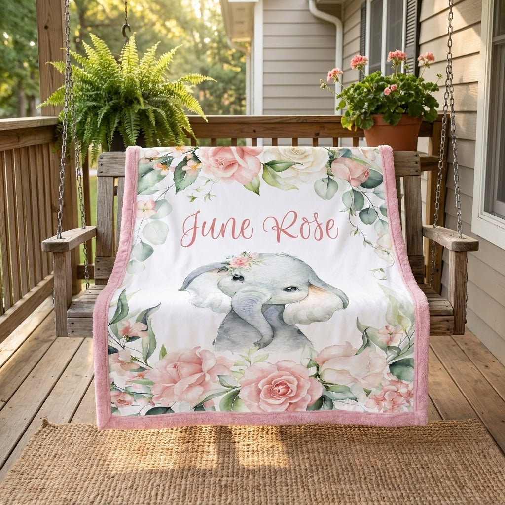 Personalized June Rose floral elephant minky blanket draped over a porch swing