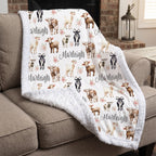 Personalized goat and floral minky baby blanket draped over armchair by a fireplace