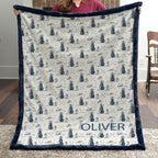 Woman holding personalized golf-print minky blanket with name Oliver, navy trim, indoors