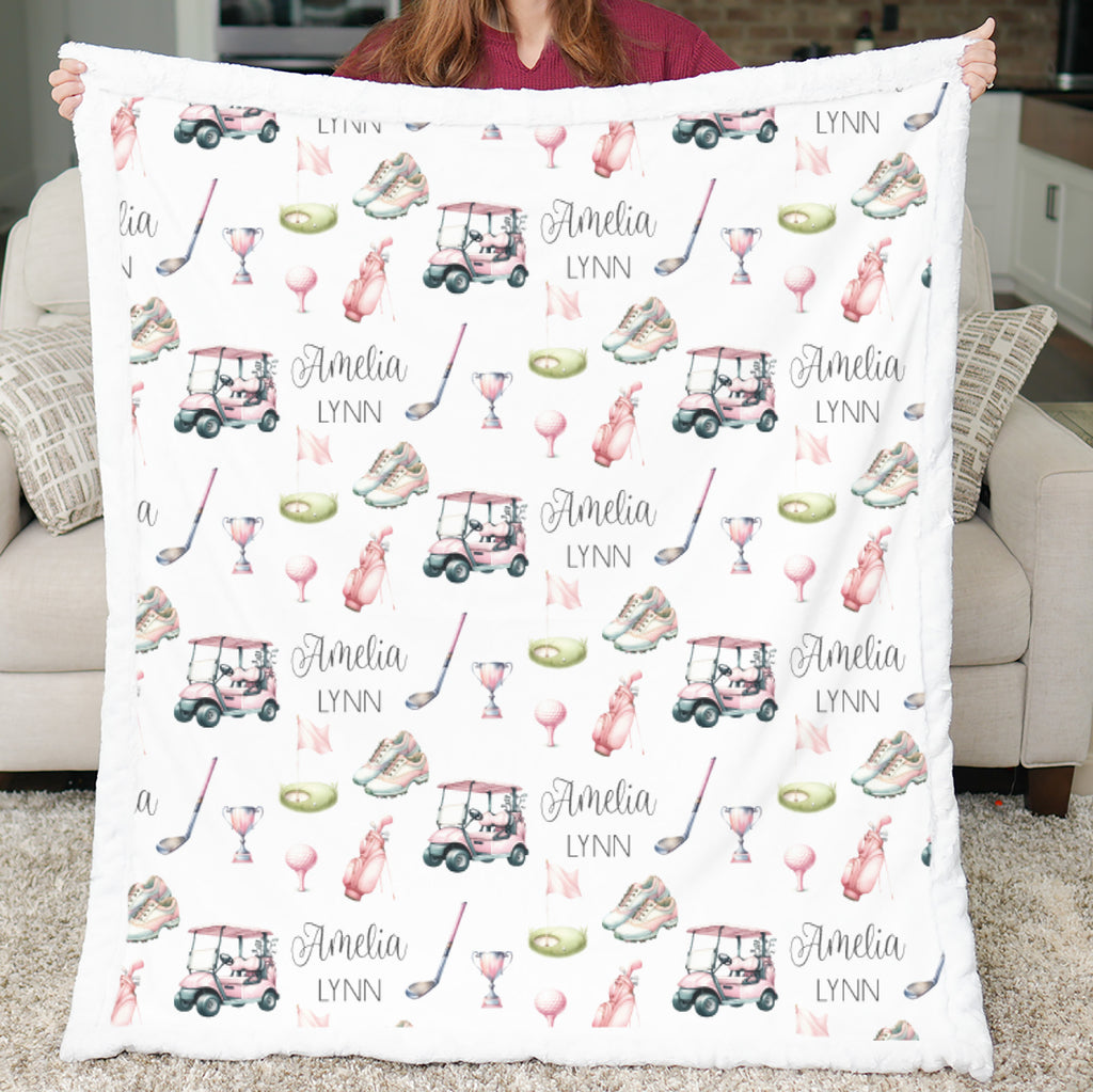 Woman holding personalized golf minky blanket with white sherpa back