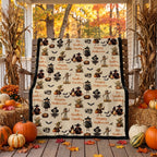 Personalized Halloween throw blanket draped over porch swing with cornstalks and pumpkins