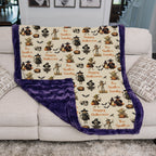 Personalized Halloween throw blanket draped over couch corner showing purple sherpa backing