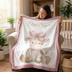 Woman holding personalized highland cow minky blanket with pink trim in nursery
