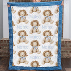 A baby blanket held up by a person, featuring a repeating pattern of teddy bears with blue bows and the name 'Mateo' printed in light blue, finished with a plush blue border.