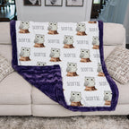 Woman holding personalized owl minky blanket with purple trim