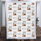 Personalized owl minky blanket with white sherpa back draped over nursery crib