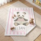 Personalized minky panda baby blanket flat-lay on nursery rug with toys