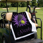 Personalized purple pickleball blanket with name Nicole draped over a golf cart seat