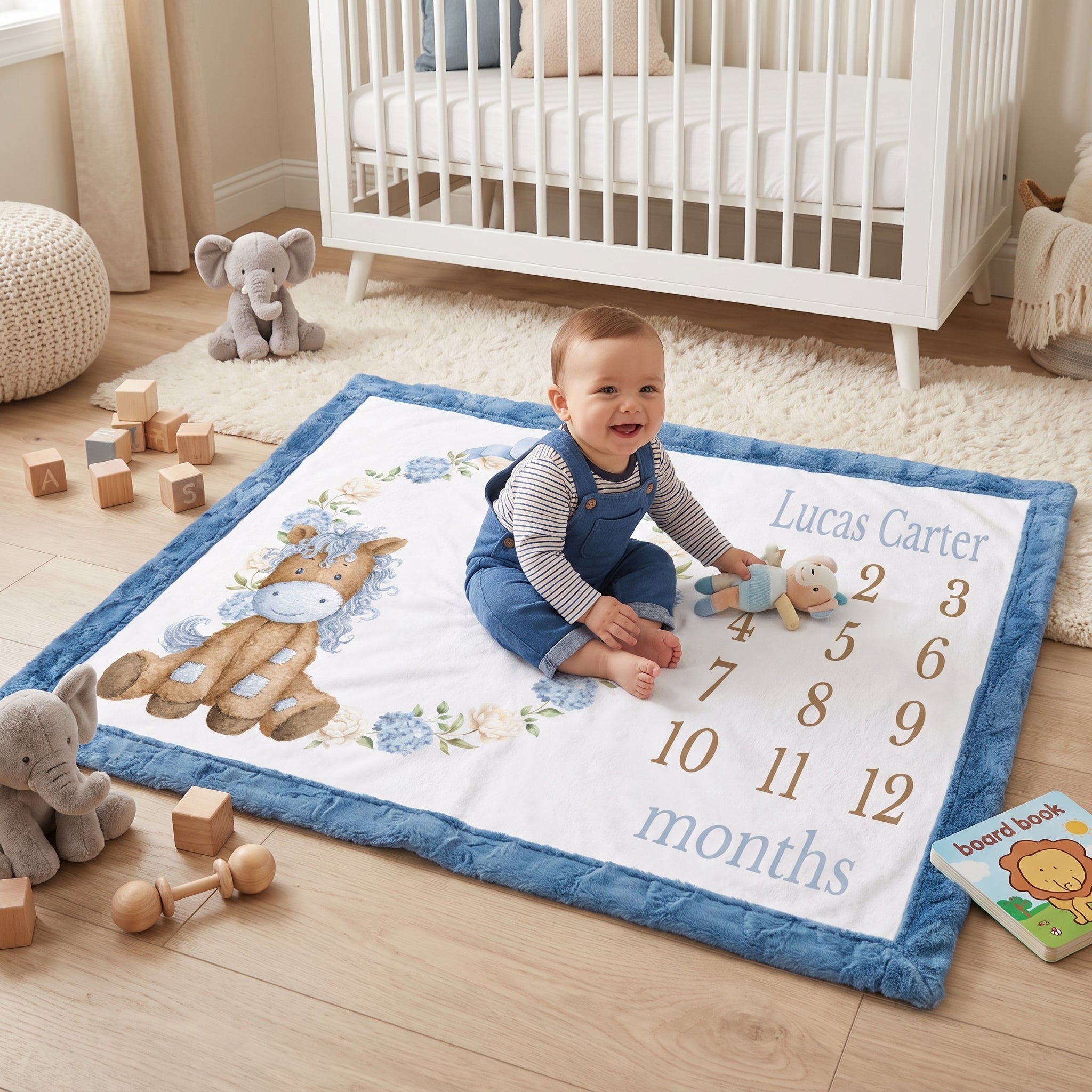 Baby sitting on personalized pony milestone blanket with toys in nursery