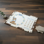 Personalized pony milestone minky blanket with blue trim held up by boy indoors