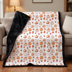 Personalized pumpkin patch throw blanket with black minky backing draped over couch