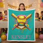 Girl holding personalized softball minky blanket with Kensley name at birthday party