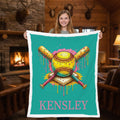 Teen girl holding personalized teal softball minky blanket with Kensley name in rustic cabin