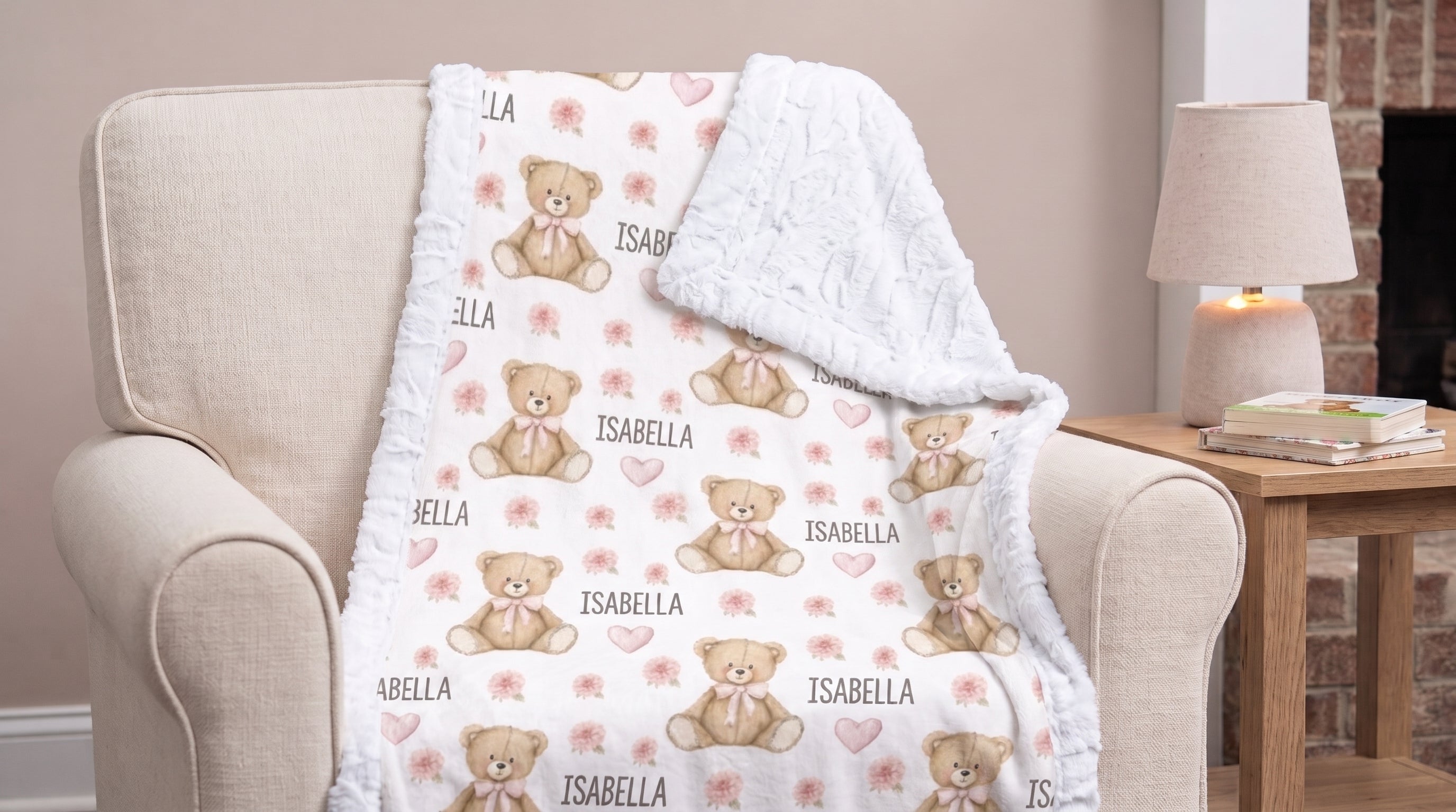 Personalized teddy bear minky baby blanket draped over armchair with white minky back