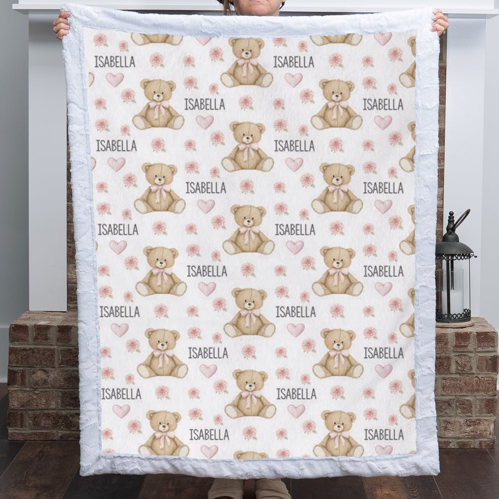 Woman holding personalized teddy bear minky baby blanket with white rosette minky border