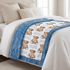 Personalized teddy bear minky baby blanket draped across a bed with white linens