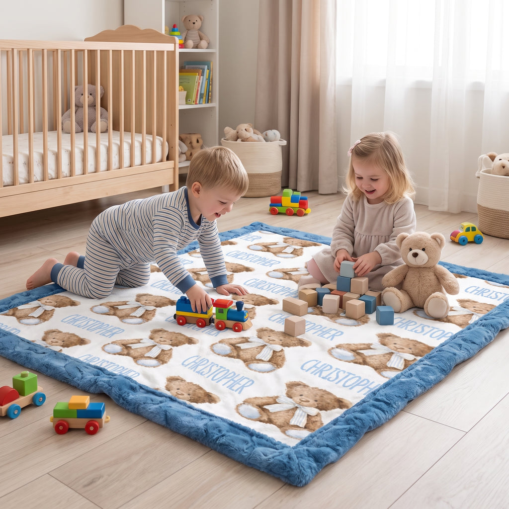 Personalized teddy bear minky baby blanket used as a playmat with kids and toys in nursery