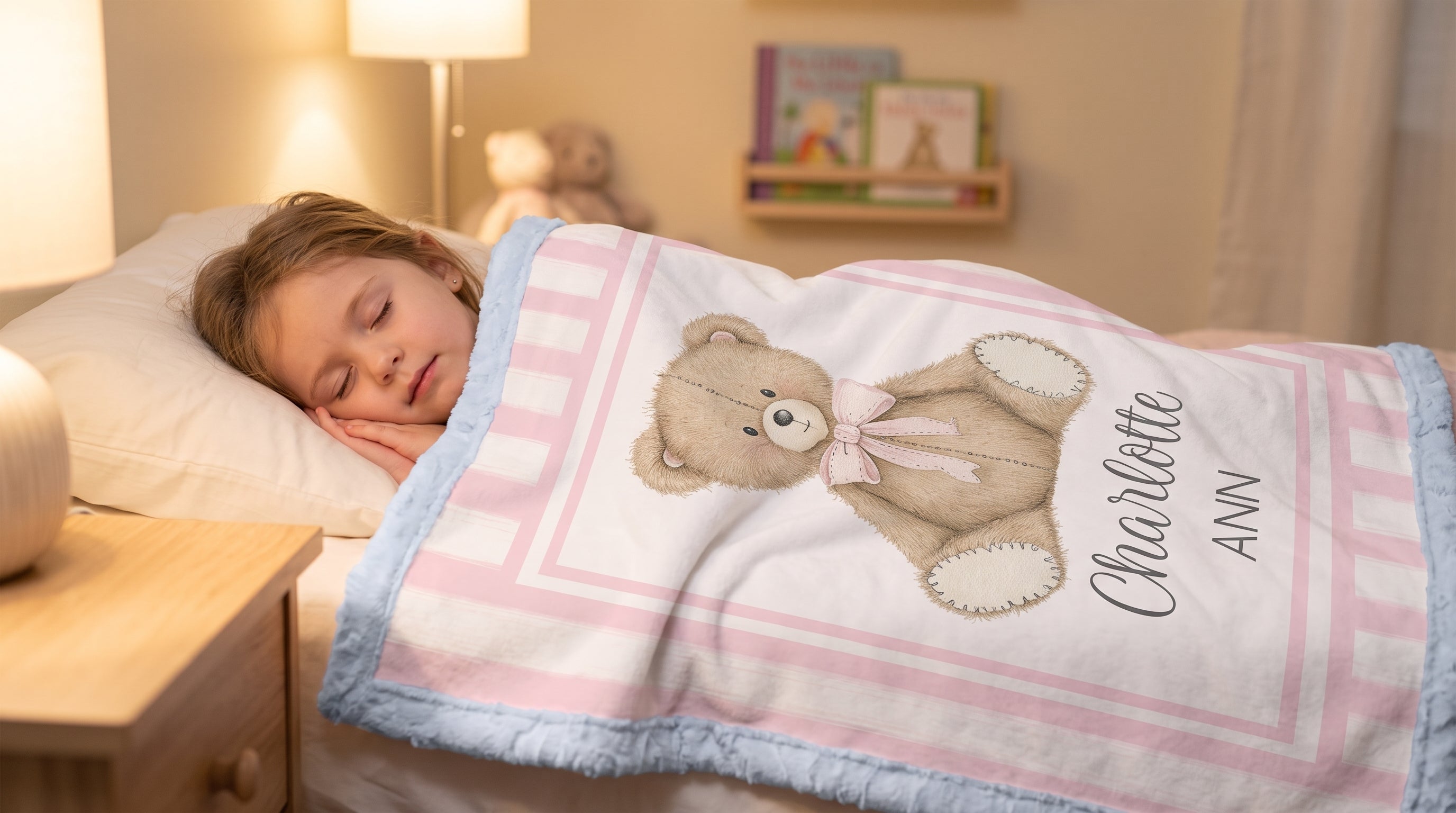 Young girl sleeping tucked under personalized minky teddy bear baby blanket in bed