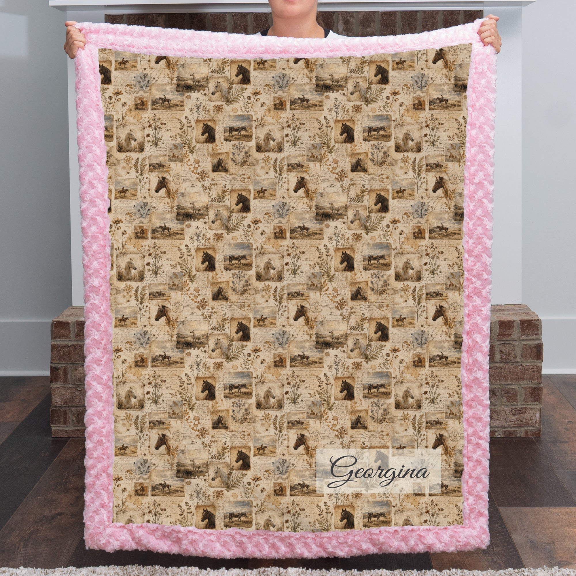 Woman holding personalized western horse blanket with custom name, pink rosette faux fur trim