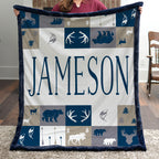 Woman holding personalized woodland minky blanket with navy trim