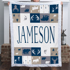 Woman holding personalized woodland minky blanket with white trim