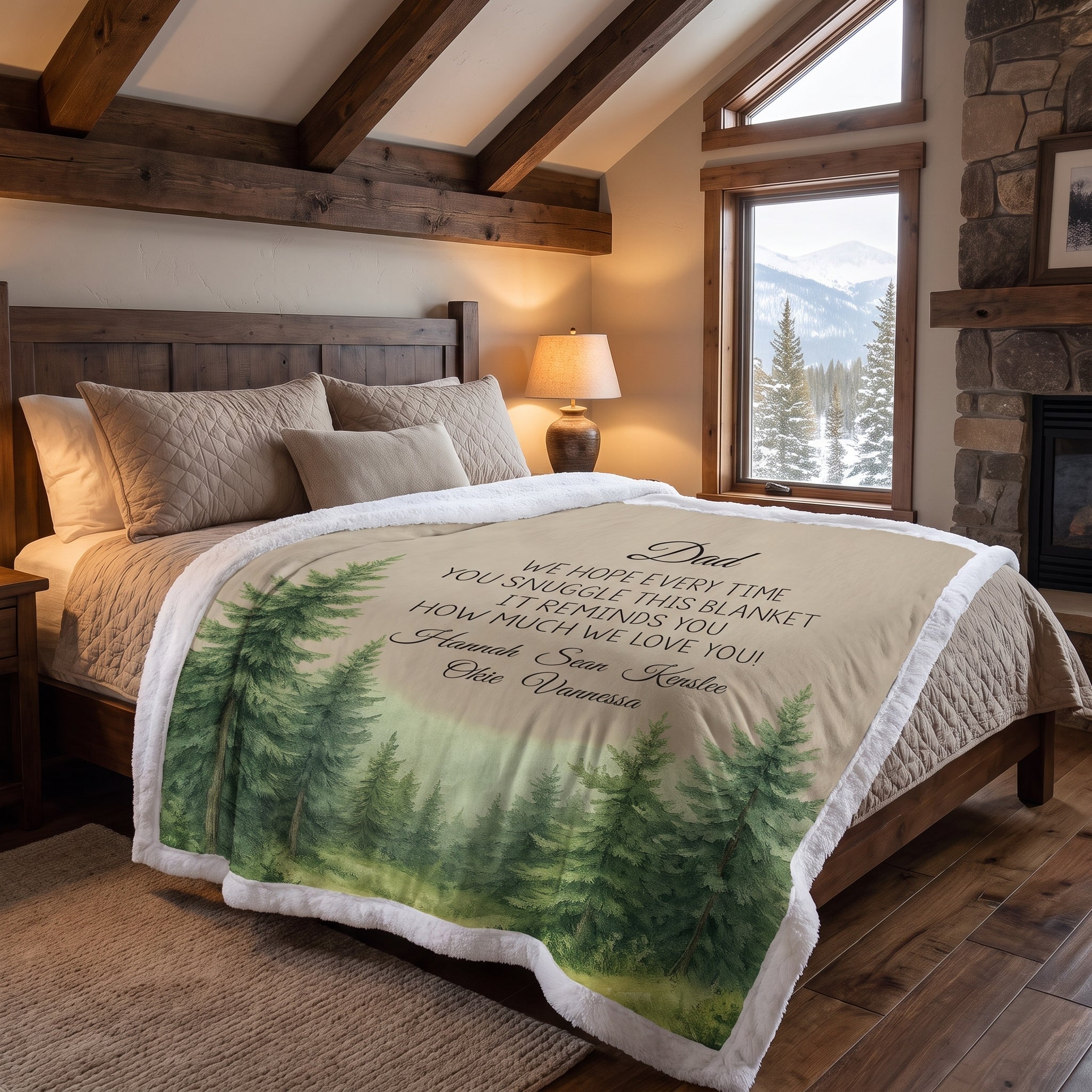 Personalized woodland minky throw for Dad laid on rustic cabin bed with stone fireplace in background