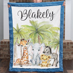 Boy holding up personalized safari animal minky baby blanket with name and jungle friends